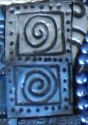 Scupley clay tile with blue and silver paint